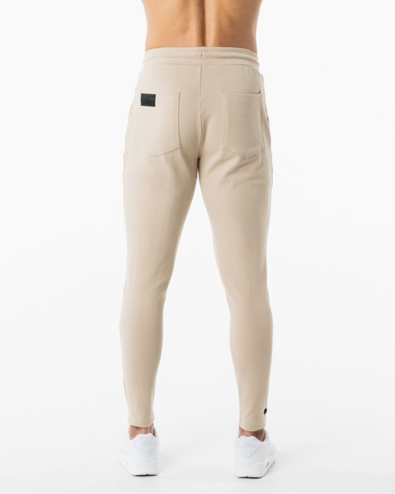 Pantaloni Jogger Barbati Alphalete Identity Bej | 572319-YTN