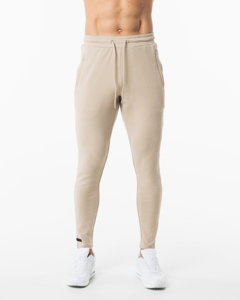 Pantaloni Jogger Barbati Alphalete Identity Bej | 572319-YTN