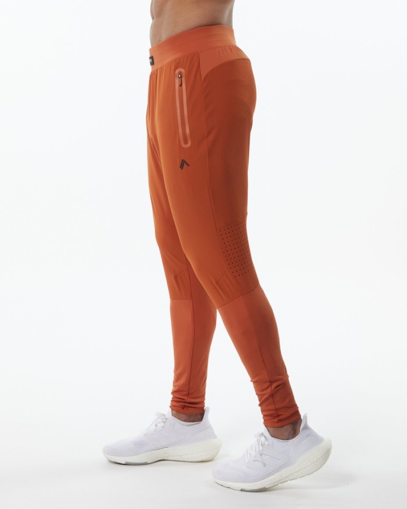Pantaloni Jogger Barbati Alphalete Infinity Tech Portocalii | 096185-MWD