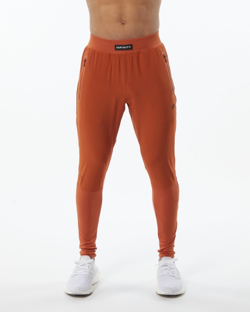 Pantaloni Jogger Barbati Alphalete Infinity Tech Portocalii | 096185-MWD