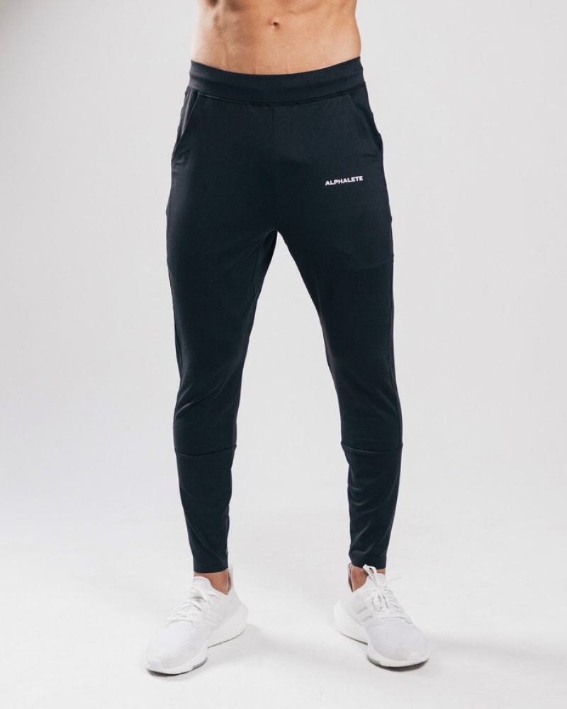 Pantaloni Jogger Barbati Alphalete Trace Negrii | 183942-ORE