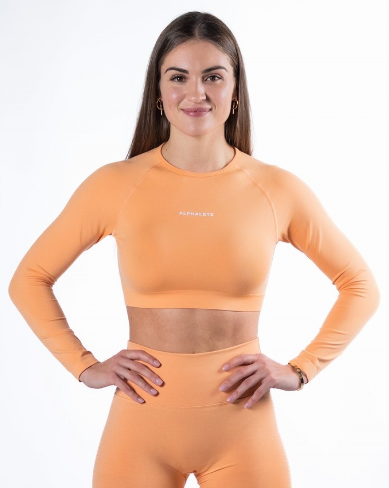 Tricouri Dama Alphalete Amplify LS Crop Corai | 039671-PRU